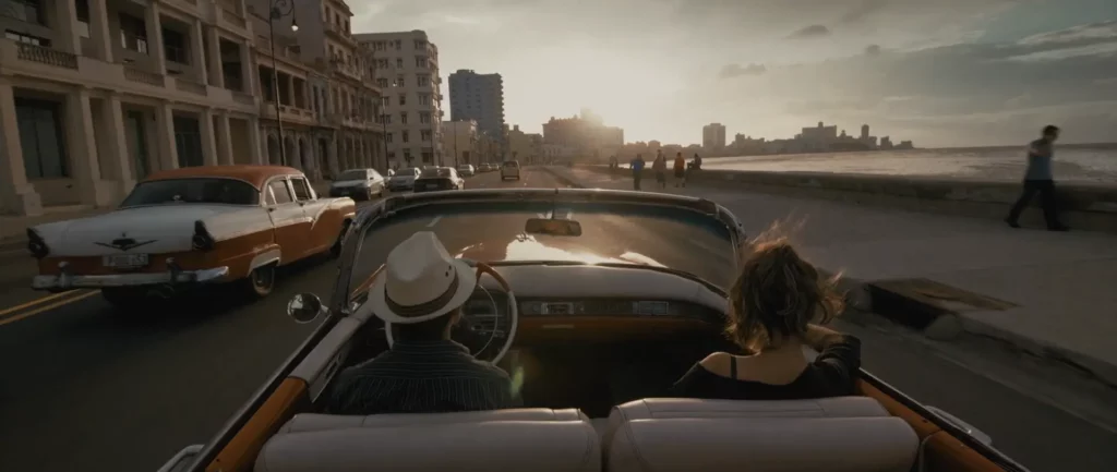 Cuba Film Commission. Shoot Cuba like a pro. A convertible classic american car rides on the Malecon esplanade of Havana at Sunset.