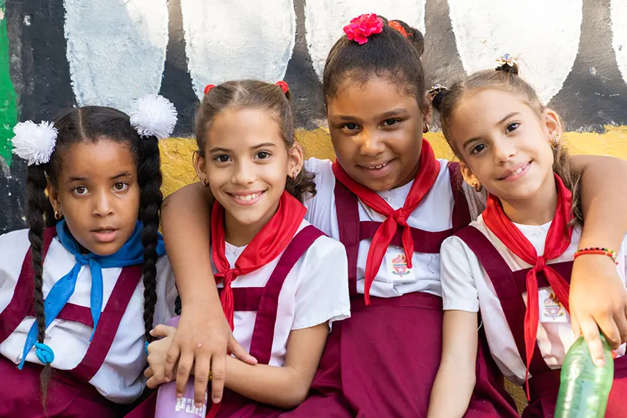 Filming in Cuba 2023
Cuban Multiracial Happy Girls in School Uniform